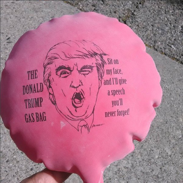 photo of a "whoopie cushion" - a prank item that when sat upon issues a rude noise reminiscent of human flatulation. This one features an image or likeness of Donald Trump.
